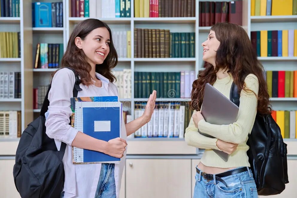Two students meeting and chatting